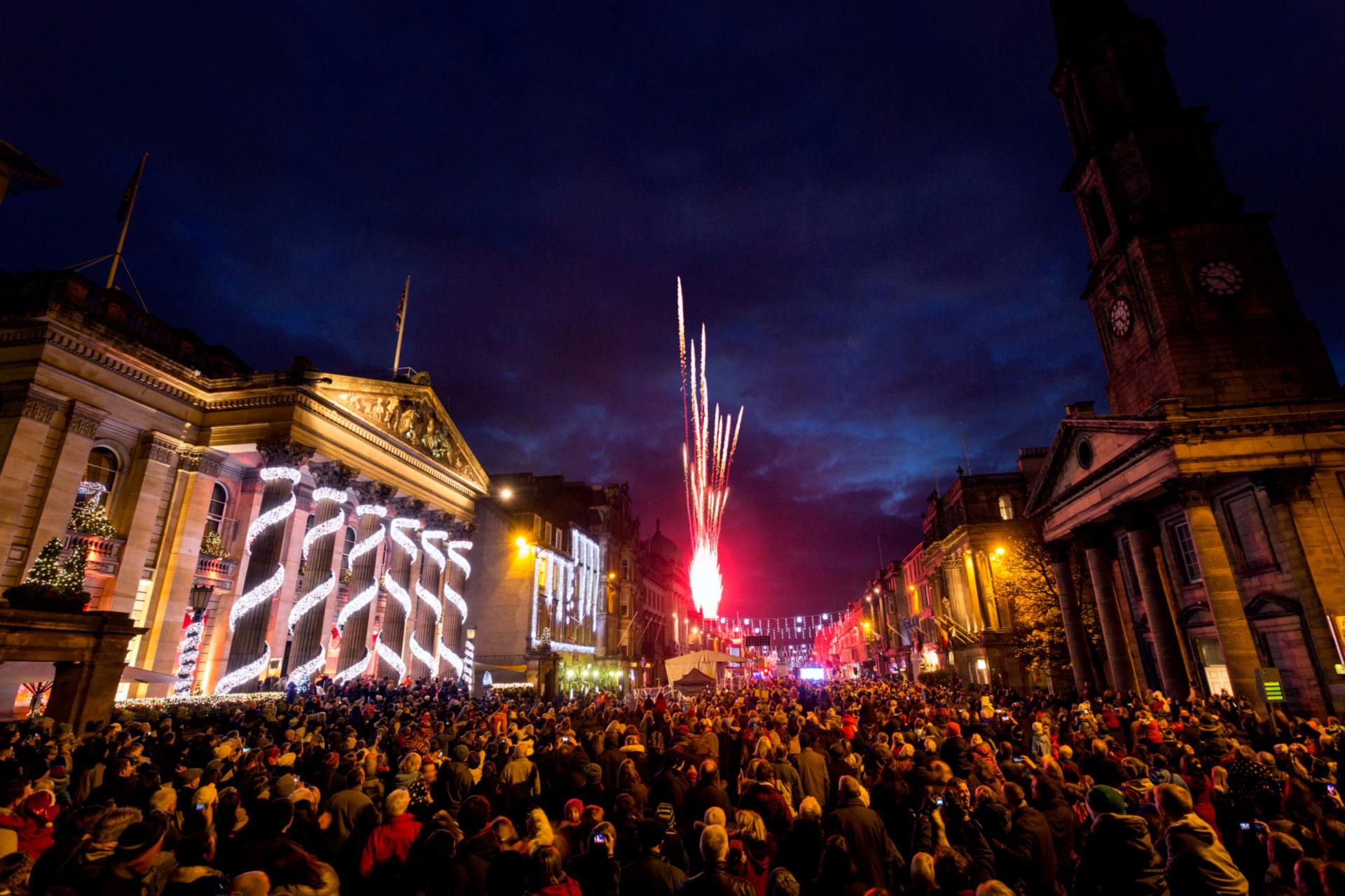Christmas lights, lots of people in Edinburgh